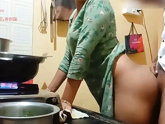 Watch this Indian COUGAR with a ample ass get down and sloppy in the kitchen